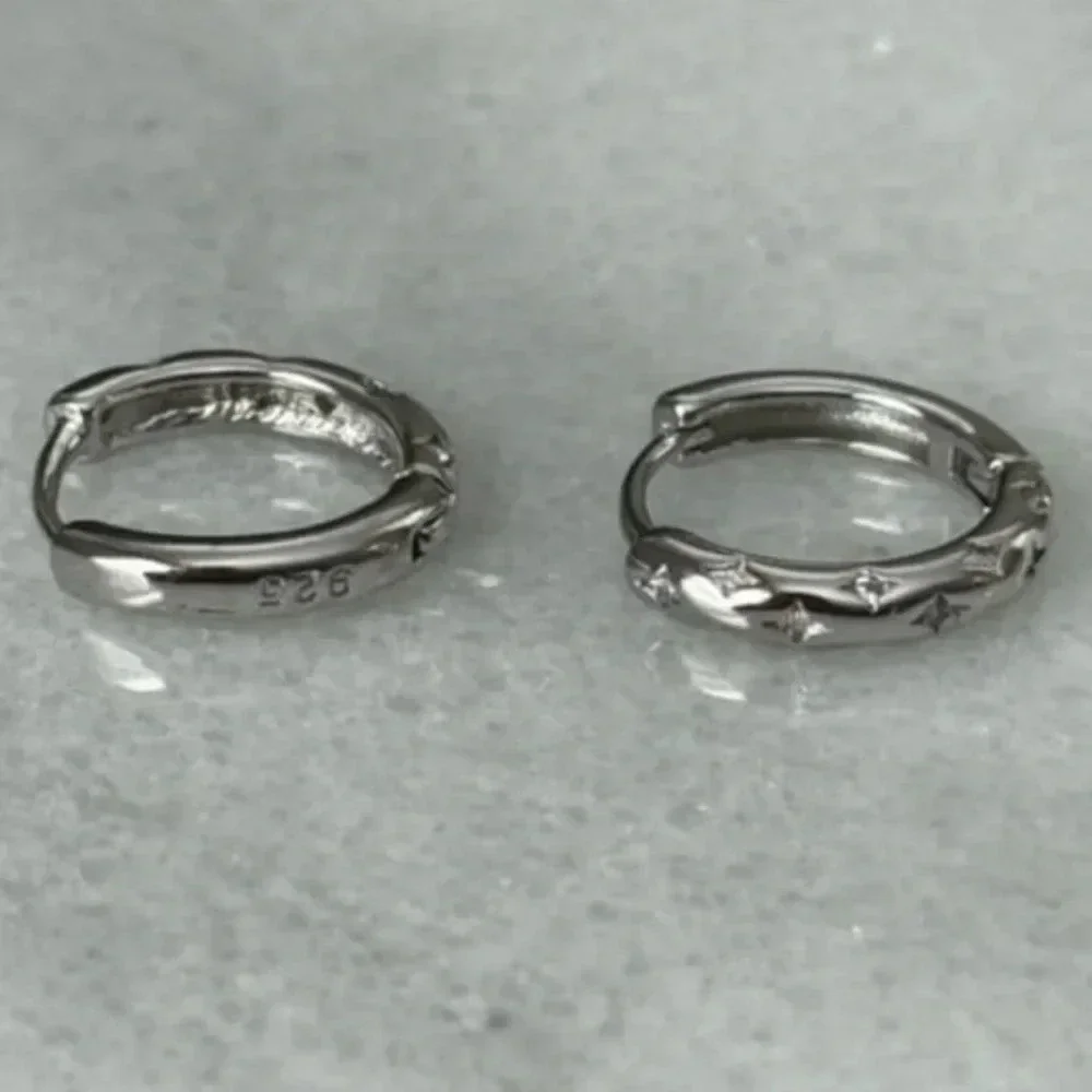 New Stock! Sterling Silver Star Crystal Pave Hoop Earrings

Brand New - Picture 5 of 5
